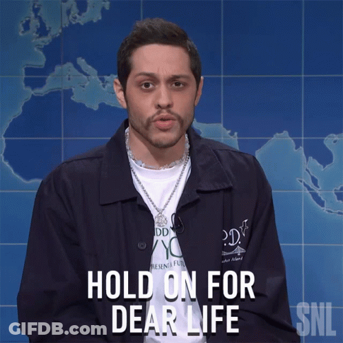 Man In Jacket Says Hold On For Dear Life GIF