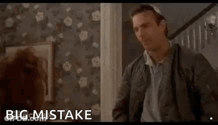 Man In Jacket Standing Next To Woman In Hallway GIF