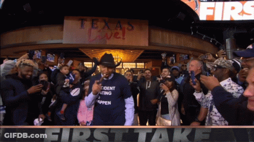 Man In Jacket With Letter M GIF