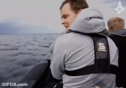 Man In Jacket With Letter S On Back GIF