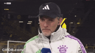 Man In Jacket With Letter T GIF