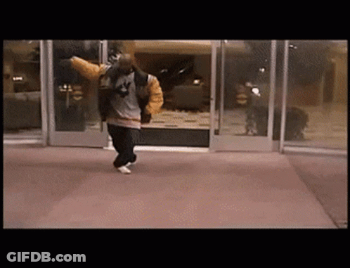 Man In Jacket With Number 4 Walking Through Doorway GIF