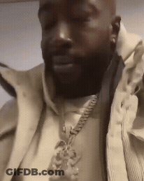 Man In Jacket With P Necklace GIF