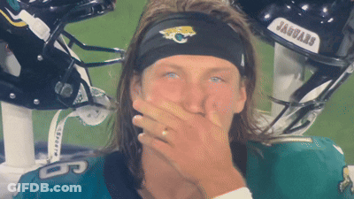 Man In Jaguars Headband Covering Mouth GIF