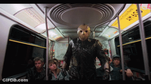 Man In Jason Voorhees Costume On Bus GIF