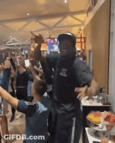 Man In Jeff The Gauntlet Shirt Dancing In Crowd GIF
