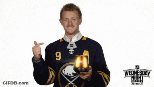Man In Jersey Number 9 Holding Cup GIF