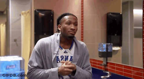 Man In Jersey Saying A2wa In Bathroom GIF