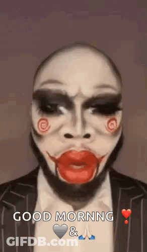 Man In Jigsaw Puppet Makeup Says Good Morning GIF