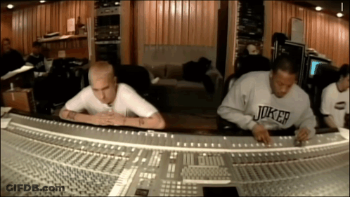 Man In Joker Sweatshirt At Mixing Board GIF