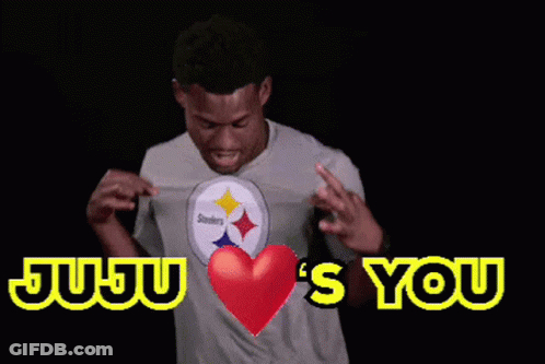 Man In Juju's You Shirt Holding Red Heart GIF