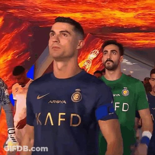Man In Kafd Shirt Before Men GIF
