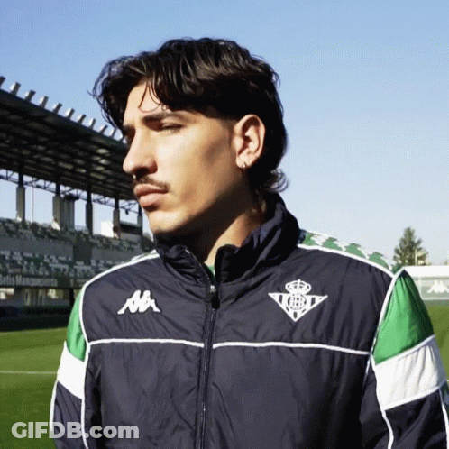 Man In Kappa Jacket In Front Of Stadium GIF