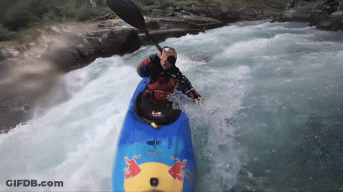 Man In Kayak With Red Bull Logo GIF