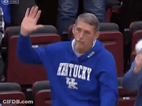 Man In Kentucky Sweatshirt Waving GIF