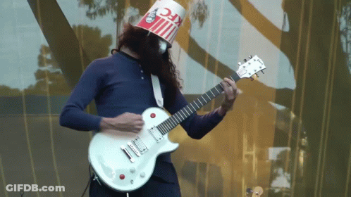 Man In KFC Bucket Hat Playing White Guitar GIF