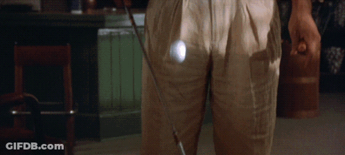 Man In Khaki Pants Holding Golf Club GIF
