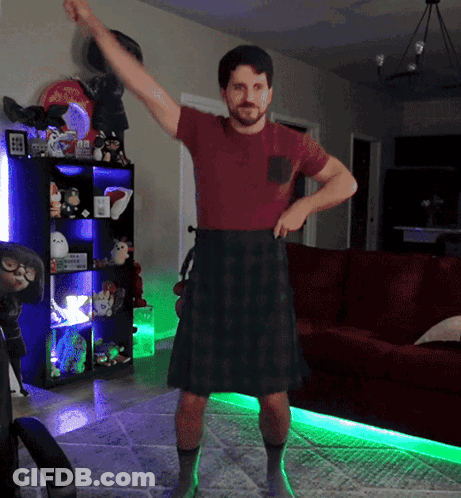 Man In Kilt And Red Shirt Dancing GIF