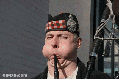 Man In Kilt Blowing Bagpipe GIF
