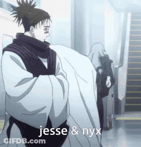Man In Kimono Next To Woman In Wheelchair GIF
