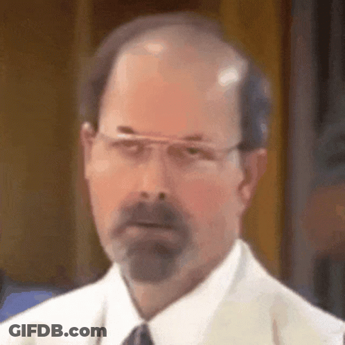Man In Kimono Sitting At Table With Food GIF