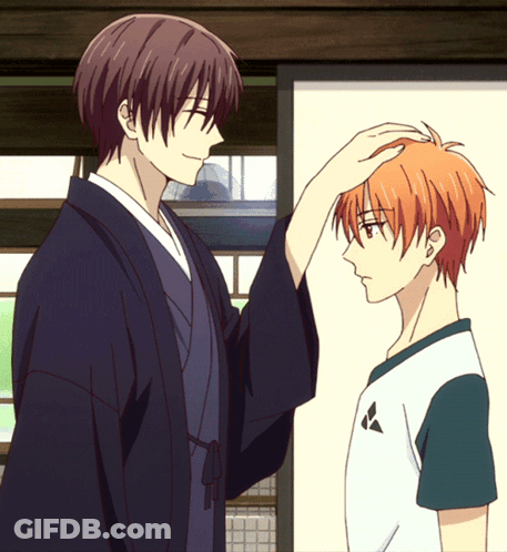 Man In Kimono Touches Head Of Man In White Shirt GIF