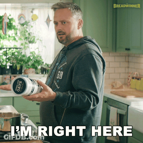 Man In Kitchen Holding Steel Cut Oats Saying I'm Right Here GIF