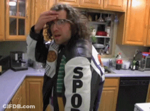 Man In Kitchen Wearing Spool Jacket GIF