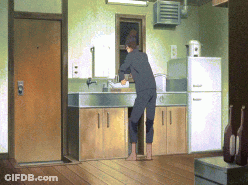 Man In Kitchen With Beer On Floor GIF