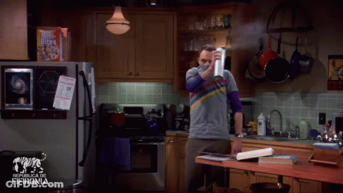 Man In Kitchen With Box Of Oats GIF