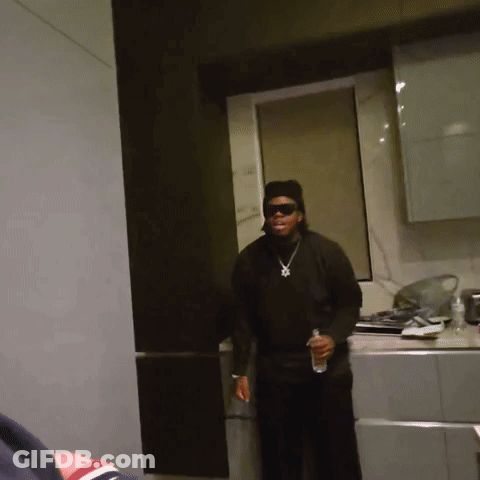 Man In Kitchen With Sunglasses And Hat GIF