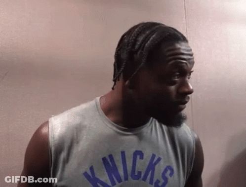 Man In Knicks Jersey Looking Left GIF