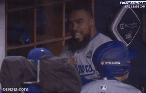 Man In La Baseball Helmet Sitting GIF