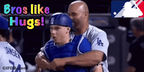 Man In LA Jersey Hugging Another Man GIF