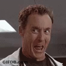 Man In Lab Coat And Stethoscope Smiling GIF