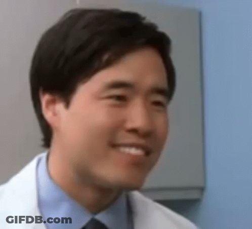 Man In Lab Coat And Tie Smiling GIF