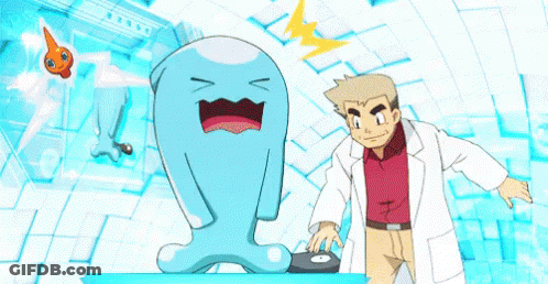 Man In Lab Coat Beside Cartoon Character GIF