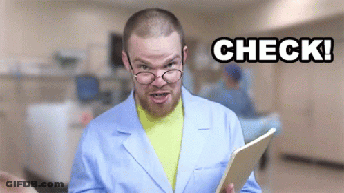 Man In Lab Coat Holding Check Tablet GIF