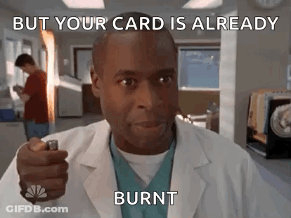 Man In Lab Coat Holding Lighter GIF