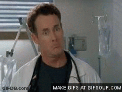 Man In Lab Coat Making Funny Face GIF
