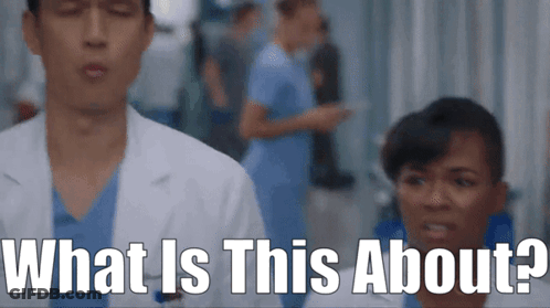 Man In Lab Coat Next To Woman In Scrubs GIF
