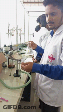 Man In Lab Coat Saying Instituto De Ciencia Y Tecnologia GIF