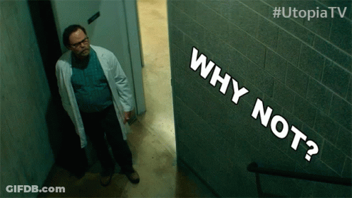 Man In Lab Coat Standing Next To Why Not Sign GIF