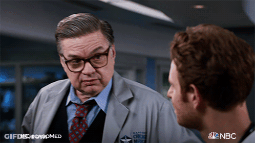Man In Lab Coat Talking In Chicagomed Ad GIF