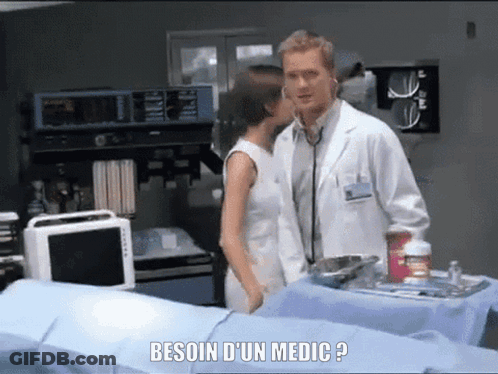 Man In Lab Coat Talking To Woman Besoin D'Un Medic GIF
