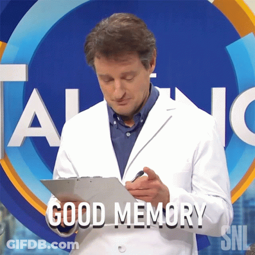 Man In Lab Coat Writing On Clipboard Saying Good Memory GIF