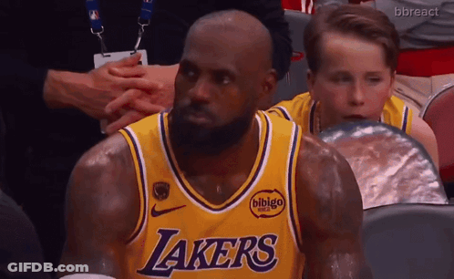 Man In Lakers Jersey Sitting GIF