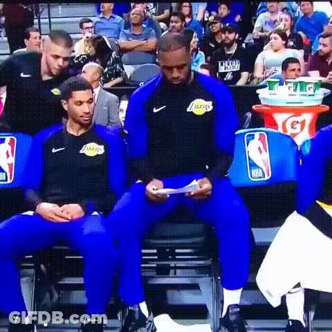 Man In Lakers Jersey Sitting In Chair GIF
