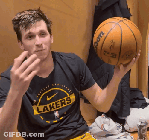 Man In Lakers Shirt Holding Basketball GIF