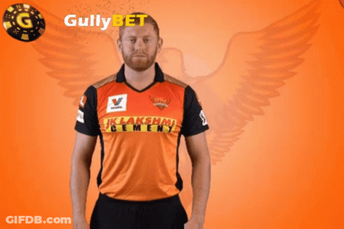 Man In Lakshmi Cement Shirt Holding Flower GIF